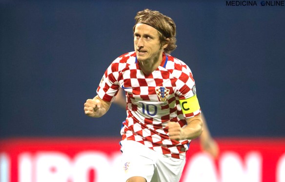 MEDICINA ONLINE Luka Modrić  calciatore croato centrocampista del Real Madrid nazionale croata capitano WORL CUP FIFA SOCCER FOOTBALL FINAL FINALE NON MOLLARE GUERRA CALCIO SPORT.jpg